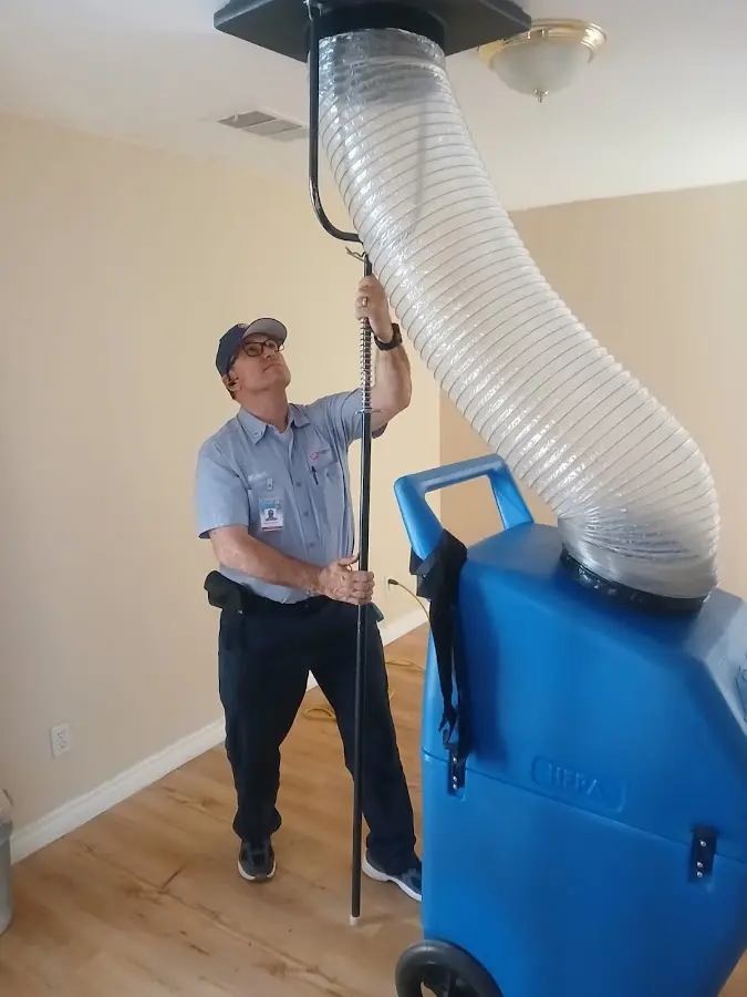 Mini Split Installation technician using HEPA equipment in Artesia